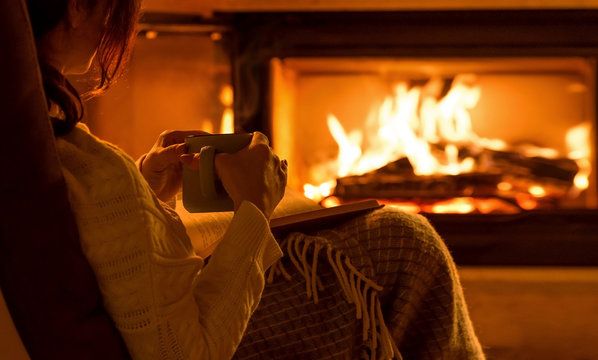 Evening fire glowing warmly in a Montclair living room